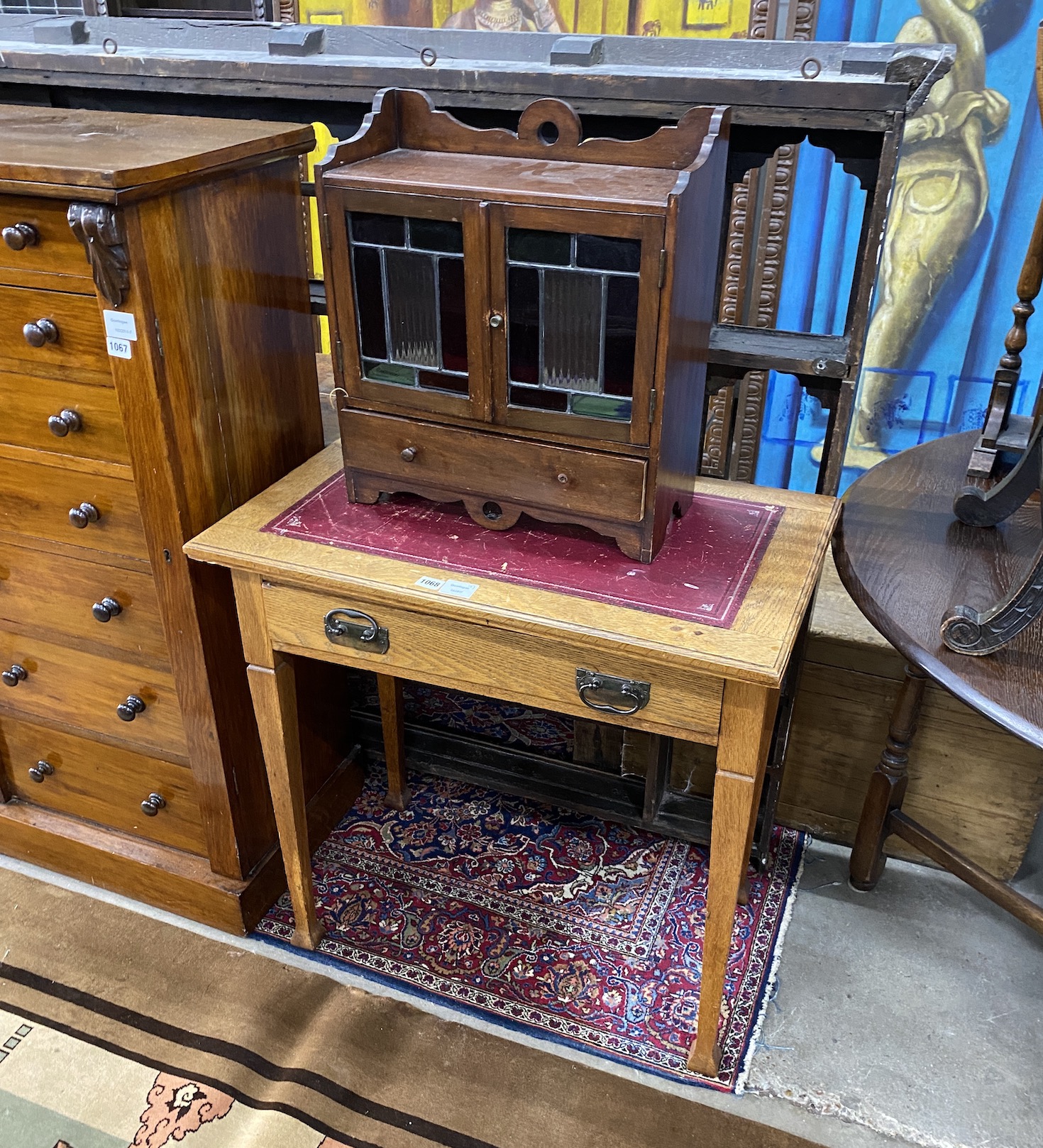 An Arts & Crafts rectangular oak writing / card table with hinged swivel top, width 76cm, depth 46cm, height 76cm